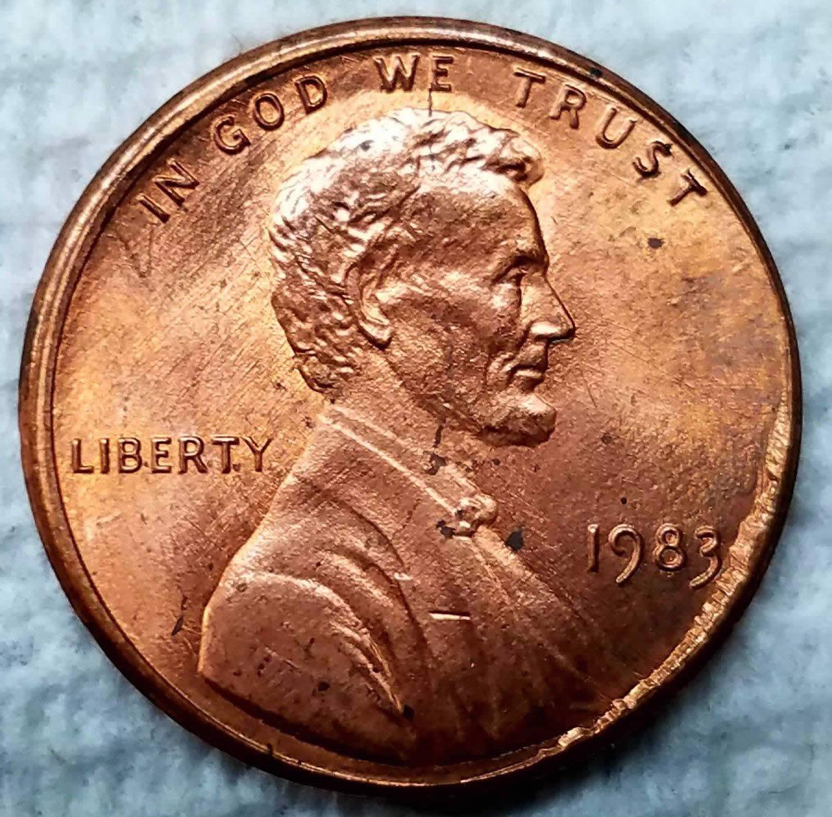 1983-P-Lincoln-In-Collar-Strike-Error-On-Obverse?
